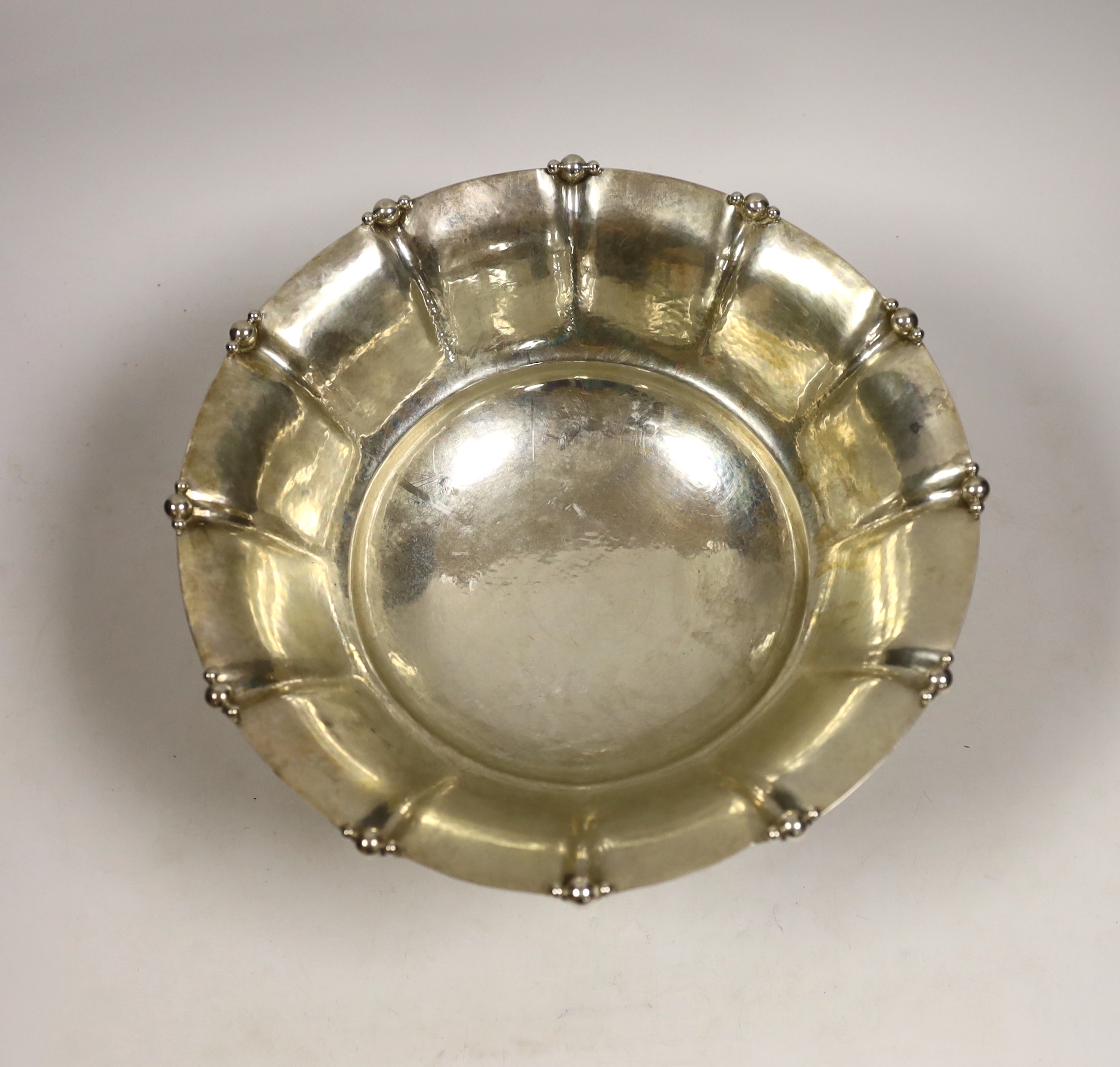 An early 20th century Swedish planished white metal circular fruit bowl, by Karl Anderson, date letter for 1916, diameter 27.1cm, 28.8oz.